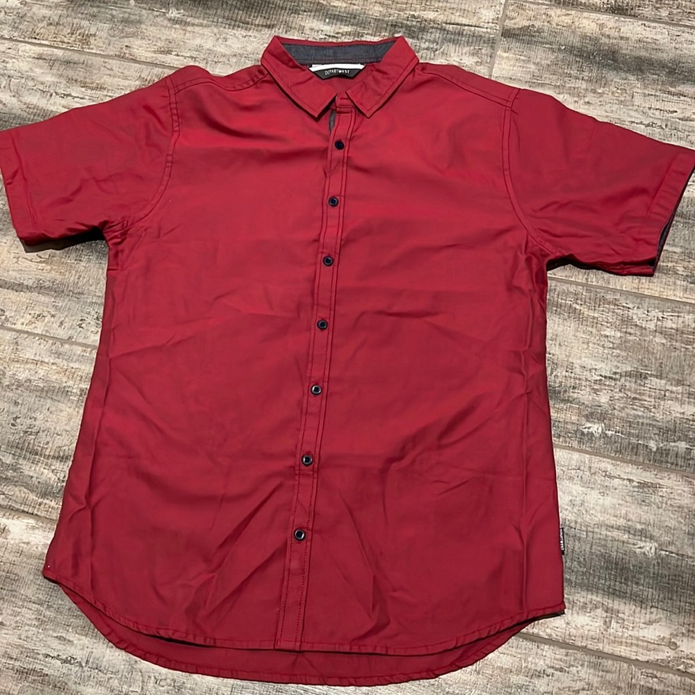 This is a large Depart West shirt. The color is a dark red.